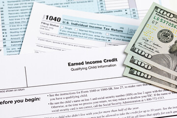 Earned income tax credit form. Tax credit, deduction and tax return concept. - obrazy, fototapety, plakaty