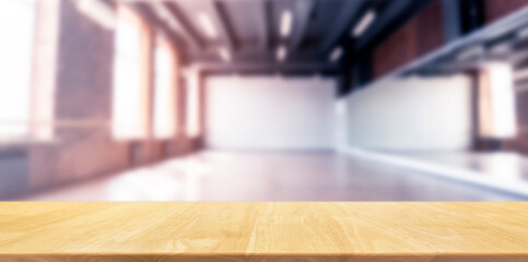 empty wood table top blurred dance yoga studio interior background