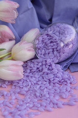 Spring depilation concept, tulips and wax. Set of depilation and beauty on blue spring removal waxing.