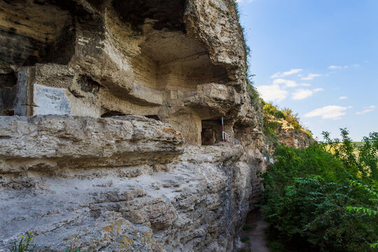 Rocky monastery with cells for monks. Background with copy space