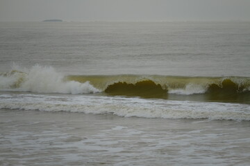 A wave at Pornichet beach in winter. the 10th January 2022, France.