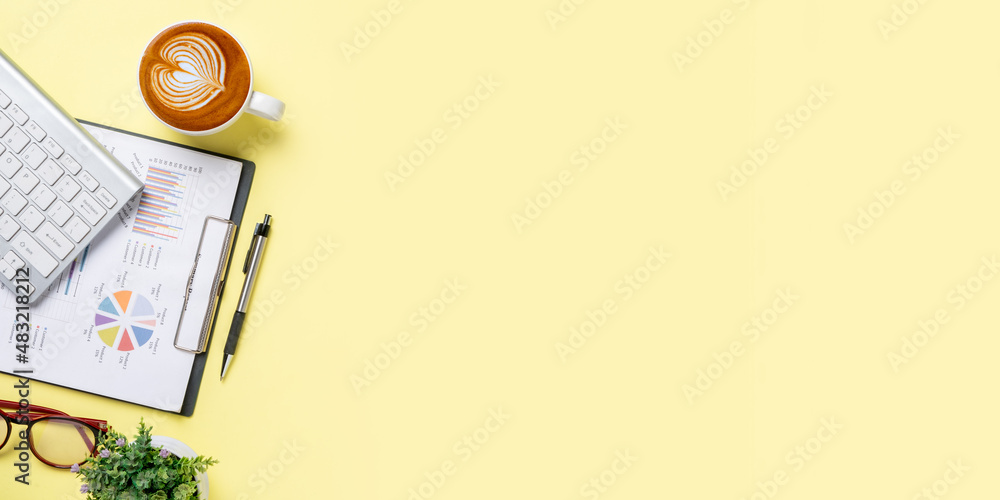 Aufkleber office desk table with analysis chart or graph, pen, cup of coffee and calculator on yellow backgrou
