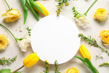 Composition made of blank card and beautiful flowers on light background