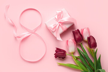 Greeting card for International Women's Day celebration with number 8 made of ribbon, beautiful tulips and gift box on color background