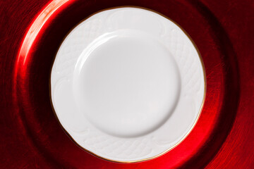 top view set of empty plates, red and white