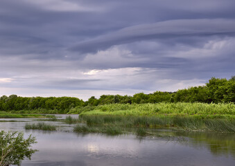 A river under a cloudy sky