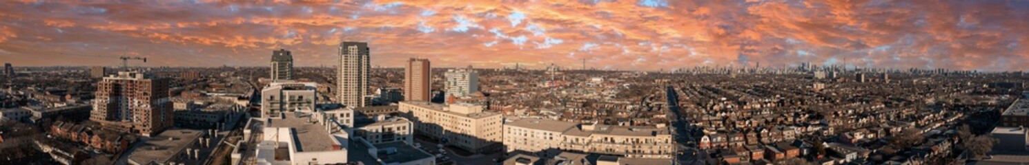 Fototapeta premium Downtown Toronto condos houses and buildings from Lansdowne and Dupont point of view in the air panorama sunset 