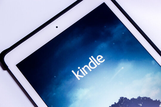 Kumamoto, Japan - Feb 6 2020 :
Kindle app, e-book reader by Amazon, on iPad in white background. From Amazon website or Kindle Store, an online e-book store by Amazon, users can purchase an e-book.