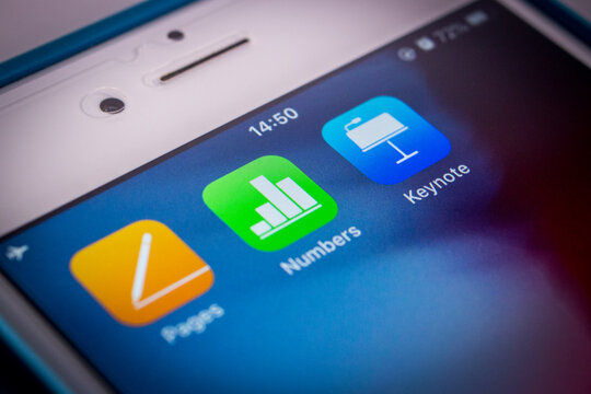 Kumamoto, Japan - Apr 10, 2020 :
Icons of iWork (Pages, Numbers and Keynote) on iPhone screen. iWork is an office suite of applications created by Apple Inc.