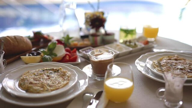 Filling luxurious rich breakfast at Golan heights pool Israel