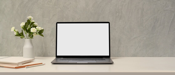 Simple minimal workspace with laptop blank screen mockup