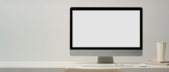 Minimal workspace or workstation interior with modern pc computer.