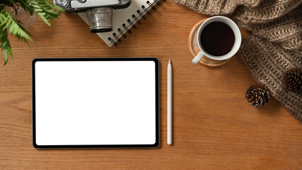 Fototapeta na wymiar Wooden coffee table with digital gadgets top view, Tablet mockup