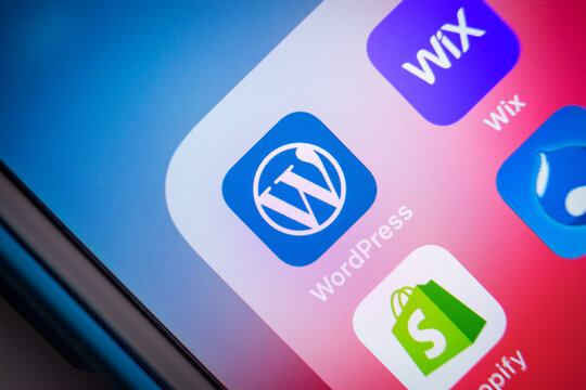 Kumamoto, Japan - May 7 2020 : Close up of WordPress icon with other CMS services (Wix, Shopify, Drupal). WordPress is a content management system (CMS) based on PHP and MySQL.