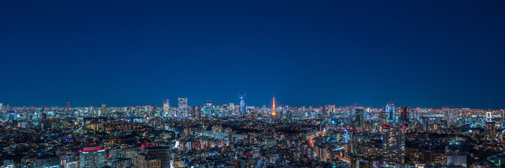 Ultra wide panorama image of Tokyo cityscape at magic hour.