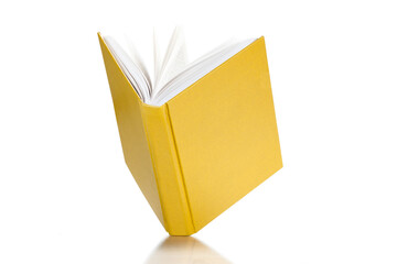 Open yellow cover book on white background
