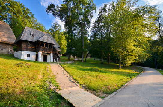 Old traditional village houses from Romania photographed at Astra Museum from Sibiu in 2012.