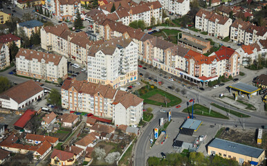 Fototapeta premium Aerial view over Odorheiu Secuiesc city (Szekelyudvarhely) from Transylvania, Romania, during a beautiful spring sunny day