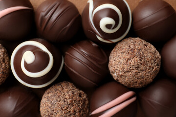 Many different delicious chocolate truffles, top view