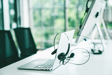 Headset and customer support equipment at call center ready for actively service . Corporate business help desk and telephone assistance concept . - obrazy, fototapety, plakaty