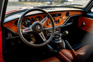 Deurstickers Vintage Sports Car 1970 Triumph GT6+ Steering Wheel Detail © Corey