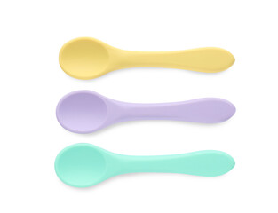 Plastic spoons isolated on white, top view. Serving baby food