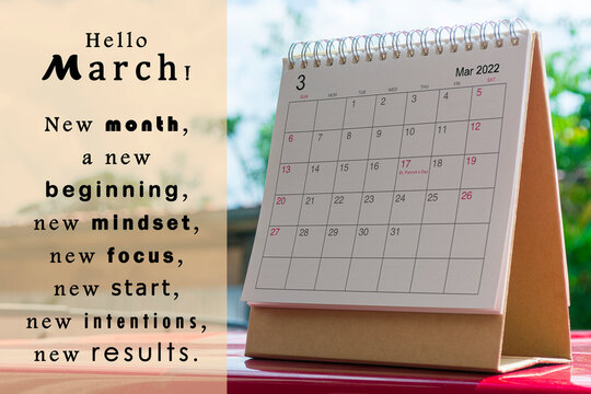 White March 2022 calendar on green background with text. New Year Concept