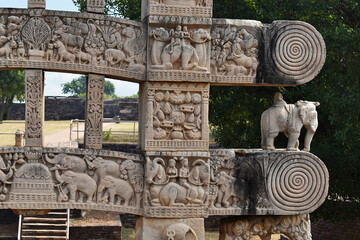 Stupa No 1, East Gateway. Rear view closeup of right side. Square blocks showing riders on Antelopes and camels. The Great Stupa, World Heritage Site, Sanchi, Madhya Pradesh, India. - obrazy, fototapety, plakaty