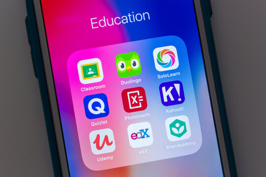 Kumamoto / JAPAN - Oct 3 2020 : Close up popular education apps / services (Classroom, Duolingo, SoloLearn, Quizlet, Photomath, Kahoot!, Udemy, edX and Khan Academy) on iPhone screen
