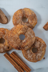 sweet home made cinnamon donuts on a table