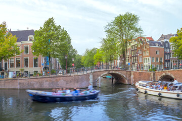 Water Traffic on the Amsterdam Canal in Spring