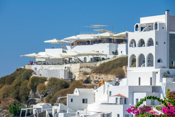 Terraces With Sun Umbrellas on the Santorini Caldera