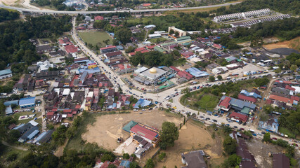 Fototapeta premium Flood situation at Hulu Langat district that causes damage of the infrastructure and housing area. Selective focus, contains dust and grain