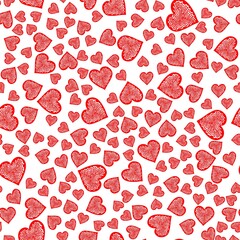 Endless abstract seamless pattern of simple red hearts of different sizes. Universal print for Valentine's Day, for apps and websites. Wallpaper for wrapping paper.