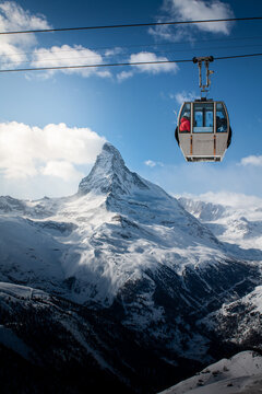 Ski Lift Passing Over Zermatt And The Matterhorn.