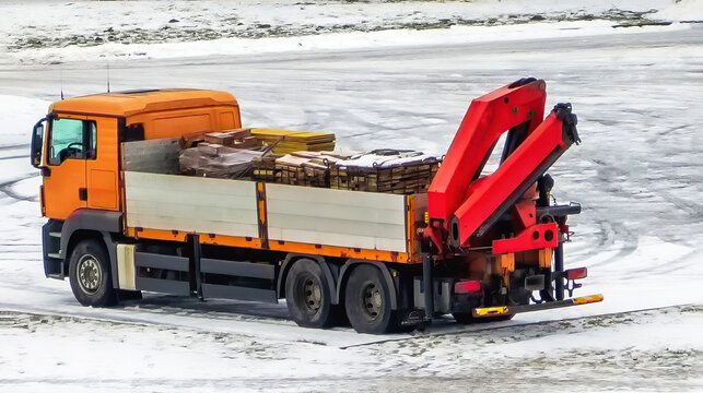 The Truck Is Loaded With Construction Materials