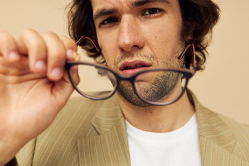 Attractive man with glasses emotions gesture hands posing isolated background