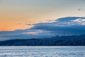 Fototapeta na wymiar Big city in the early morning view from the sea. Istanbul, Asian part. Turkey