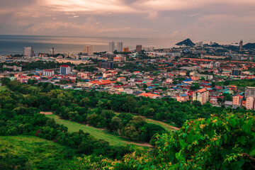 The background of the sea by the evening sea, with natural beauty (sea water, rocks, sky) and fishermen are fishing by the river bank, is a pleasure during travel.