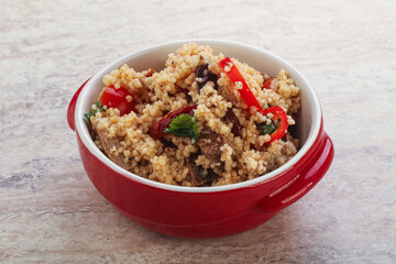 Arabic cous cous with meat and tomato