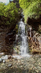 Fototapeta na wymiar The Always raining canyon (Panta Vrehei) with waterfalls in Karpenissi Greece