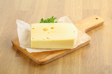 Maasdam cheese over the board