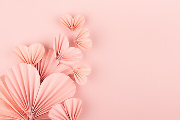 Valentine day background - flow of flying gentle pink paper ribbed hearts on soft light pink...