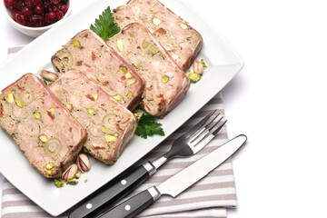 Sliced Traditional French terrine covered with bacon isolated on white background
