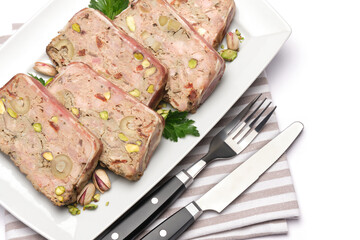 Sliced Traditional French terrine covered with bacon isolated on white background