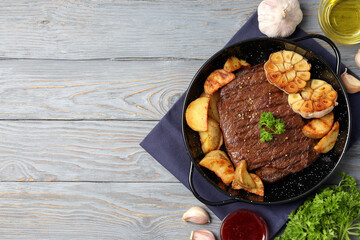 Concept of tasty food with beef steak, space for text