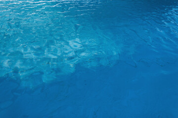 Blue colored water texture. Beautiful sea and summer vacation