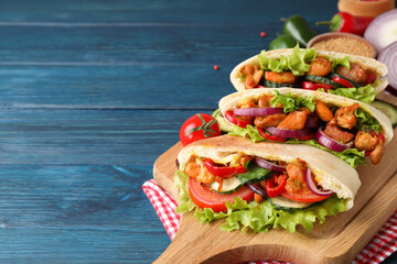Concept of tasty food with pita with chicken, space for text