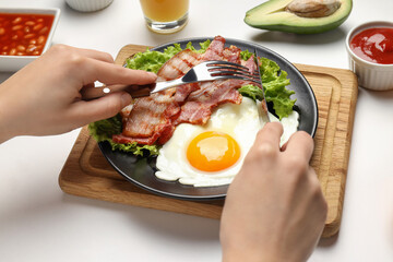 Concept of tasty breakfast on white background