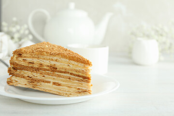 Concept of tasty dessert with honey cake, space for text